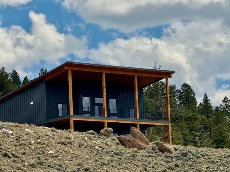 Front exterior of a new home in , Twin Lakes, CO, highlighting curb appeal (Image 23).