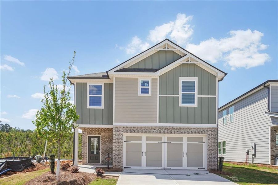 Front exterior of a new home in Hawthorne Station, College Park, GA, highlighting curb appeal (Image 23).