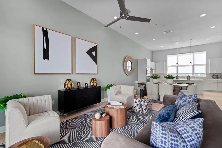 An open floor plan connects the living space directly to the kitchen. An open floor plan connects the living space directly to the kitchen.