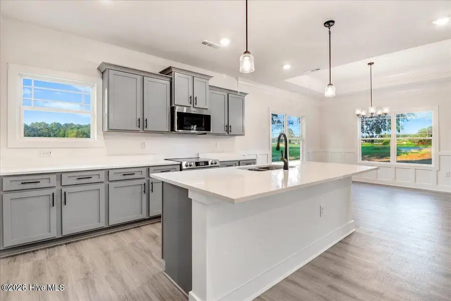 Furnished interior view inside a new home in Wood Creek, Leland (Image 4).