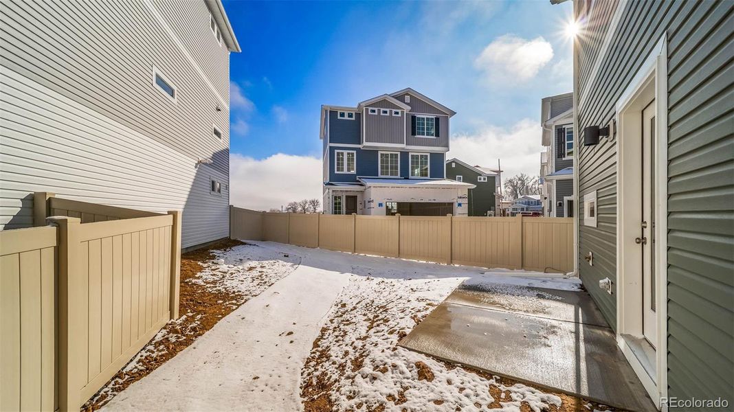 Exterior details and patio area of a home in Thompson River Ranch, Johnstown (Image 17).