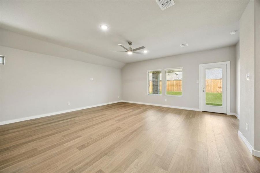 Living Room in the Oscar home plan by Trophy Signature Homes – REPRESENTATIVE PHOTO