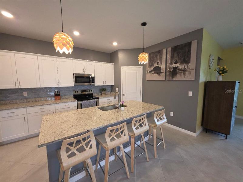 Furnished interior view inside a new home in , Port Charlotte (Image 14).