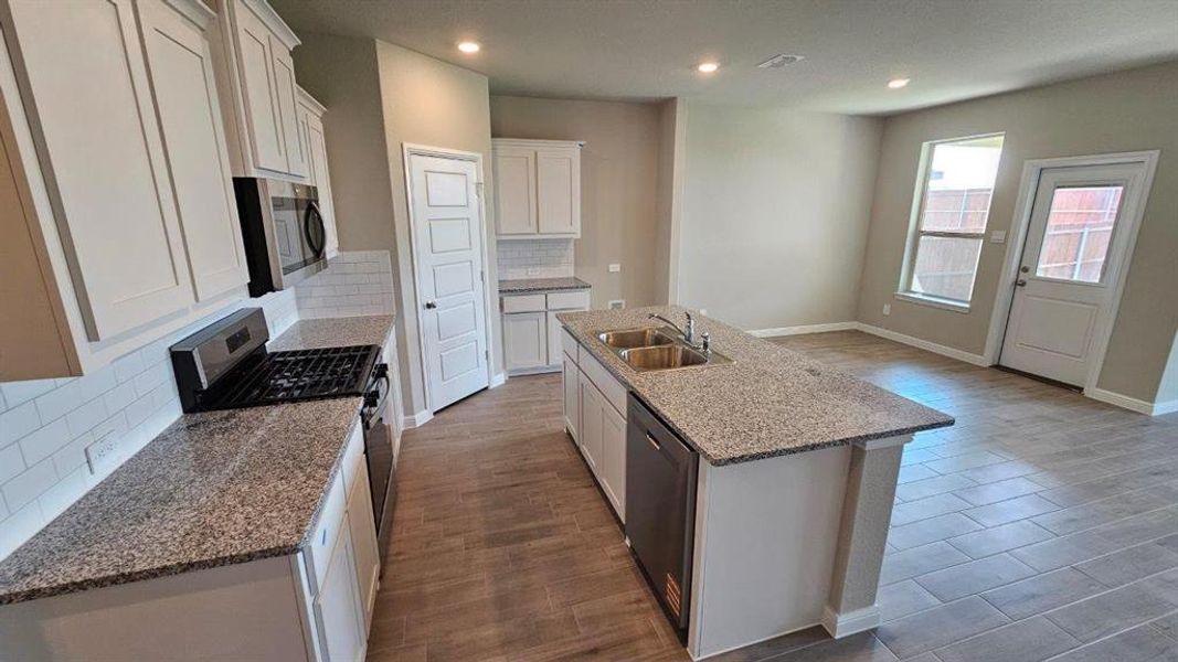 Furnished interior view inside a new home in Monarch at the Meadows, Krum (Image 6). Furnished interior view inside a new home in Monarch at the Meadows, Krum (Image 6).