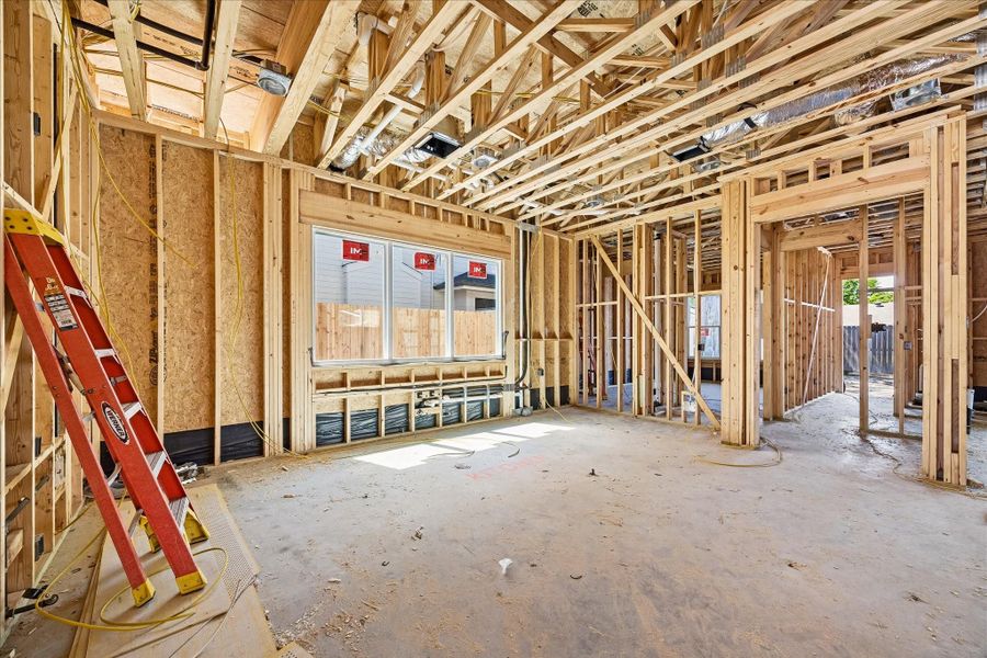 Kitchen Dining room looking towards study/guest bedroom *Current construction 4/7/26
