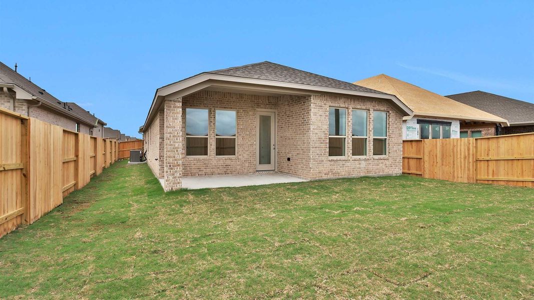 Exterior details and patio area of a home in Meridiana, Manvel (Image 4).