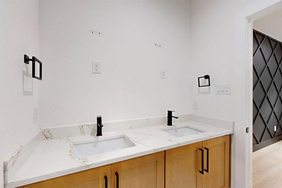 Bathroom featuring double vanity Bathroom featuring double vanity