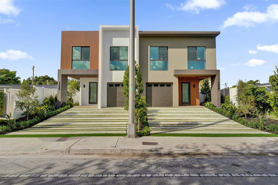 Front exterior of a new home in , Fort Lauderdale, FL, highlighting curb appeal (Image 1). Front exterior of a new home in , Fort Lauderdale, FL, highlighting curb appeal (Image 1).
