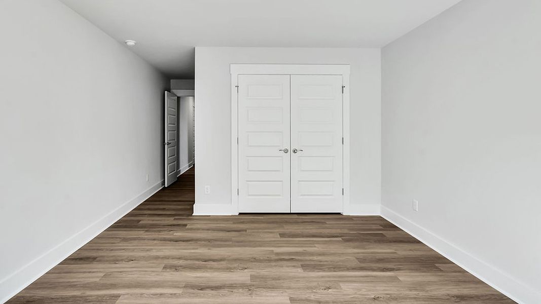 Spacious, unfurnished interior of a new home in The Haven at Indigo Preserve, Leland (Image 33).