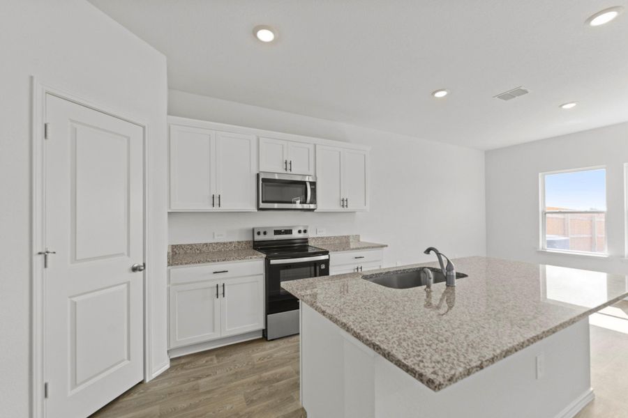 Furnished interior view inside a new home in Palomino, Manor (Image 10).