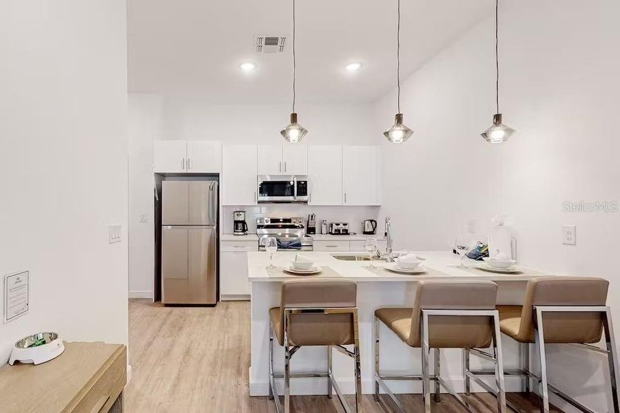 Furnished interior view inside a new home in , Davenport (Image 6).