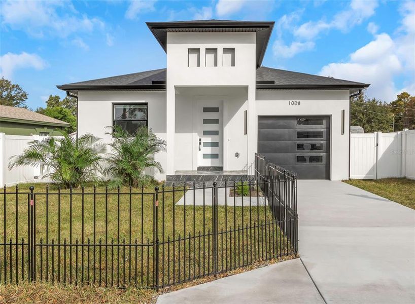 Front exterior of a new home in , Clearwater, FL, highlighting curb appeal (Image 2).