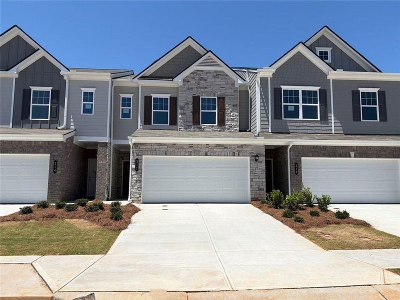 Front exterior of a new home in Jameson Towns, Villa Rica, GA, highlighting curb appeal (Image 1). Front exterior of a new home in Jameson Towns, Villa Rica, GA, highlighting curb appeal (Image 1).