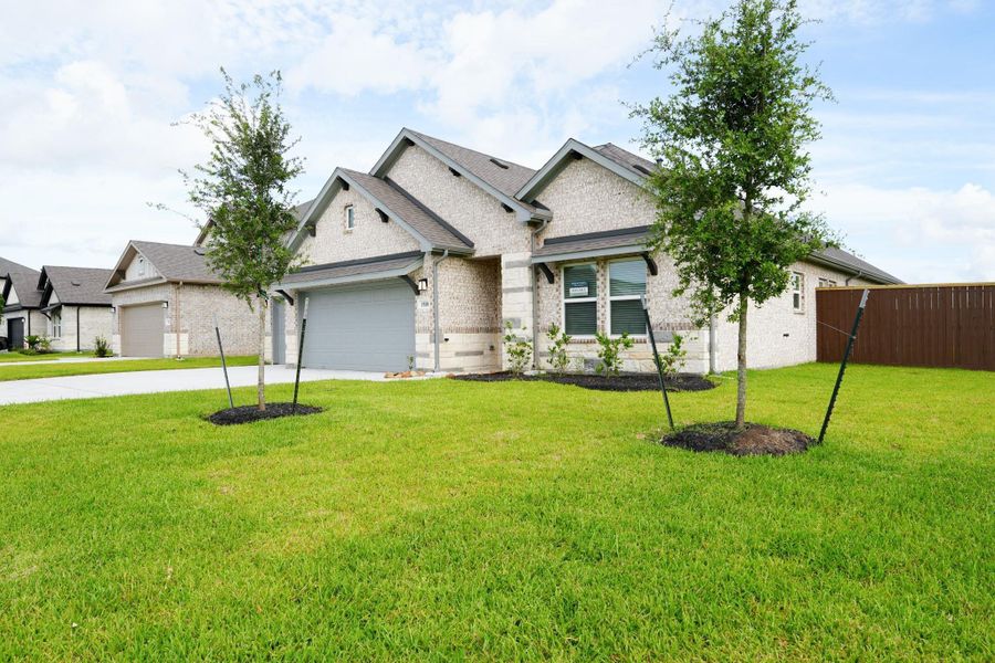 Front exterior of a new home in Foxtail Palms, Manvel, TX, highlighting curb appeal (Image 19).