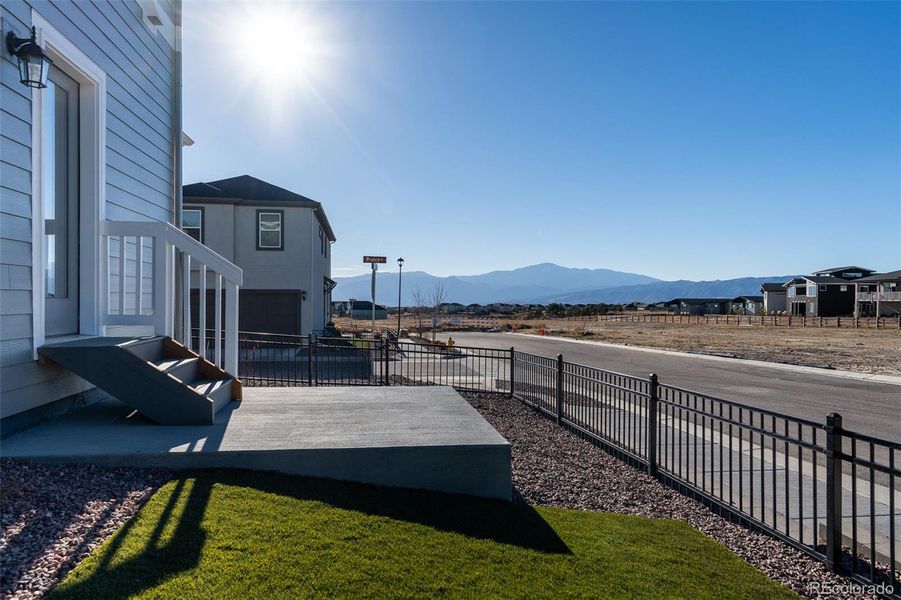 Exterior details and patio area of a home in Revel Crossing at Wolf Ranch – The Outlook Collection, Colorado Springs (Image 4).