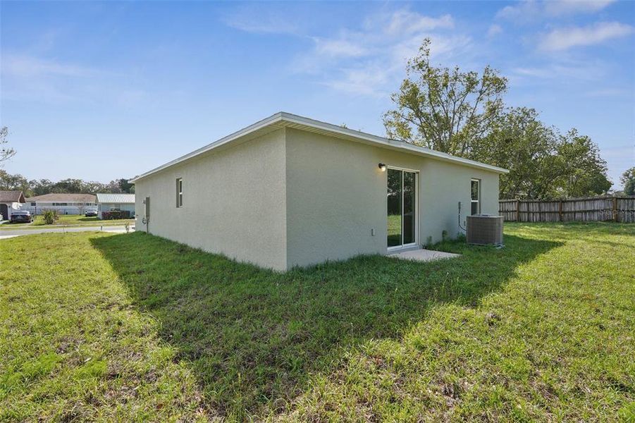 Exterior details and patio area of a home in Marion Oaks, Ocala (Image 17).