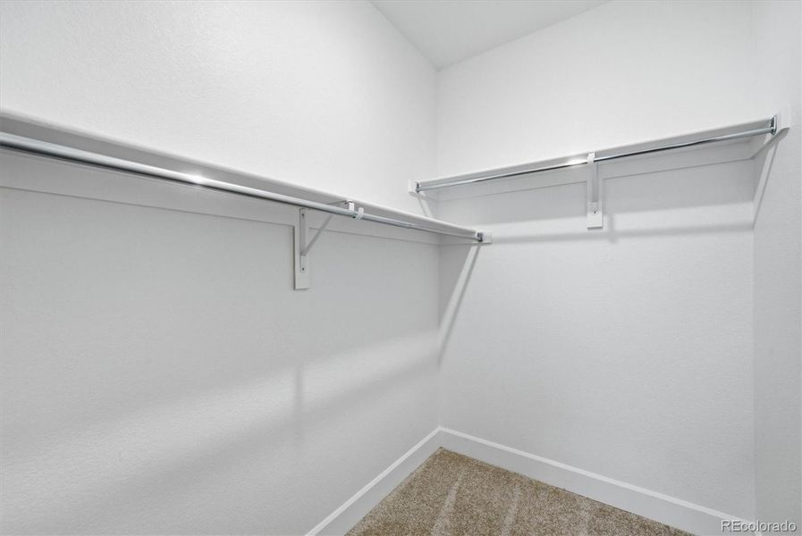 Example of what all bedroom walk in closets look like in the home (with the exception of the primary closet).