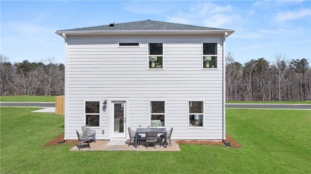 Exterior details and patio area of a home in The Bluffs, Canton (Image 3).