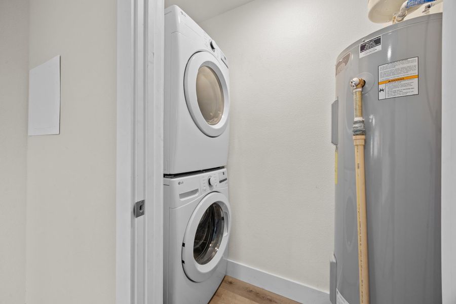 Stackable washer/dryer laundry room, perfect for guests or multi-generation living,