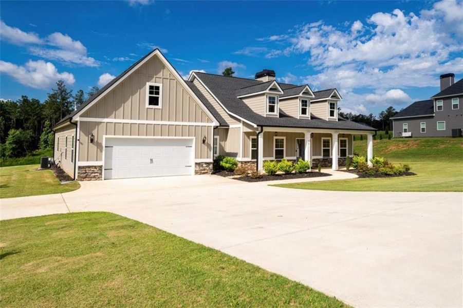Front exterior of a new home in , Newnan, GA, highlighting curb appeal (Image 25).