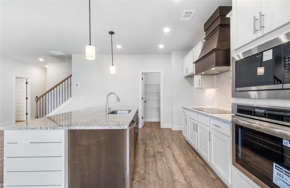 Furnished interior view inside a new home in Ridge Pointe, Athens (Image 3).