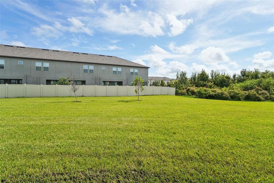Front exterior of a new home in Lagoon Residences at Epperson, Wesley Chapel, FL, highlighting curb appeal (Image 2). Front exterior of a new home in Lagoon Residences at Epperson, Wesley Chapel, FL, highlighting curb appeal (Image 2).