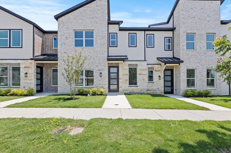Front exterior of a new home in , Rowlett, TX, highlighting curb appeal (Image 17).