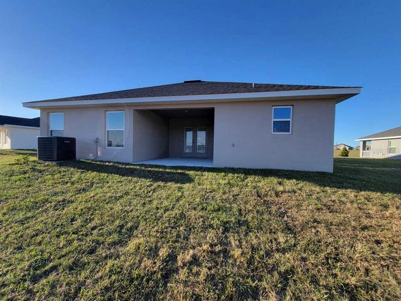 Exterior details and patio area of a home in Ocala Crossings South, Ocala (Image 3).