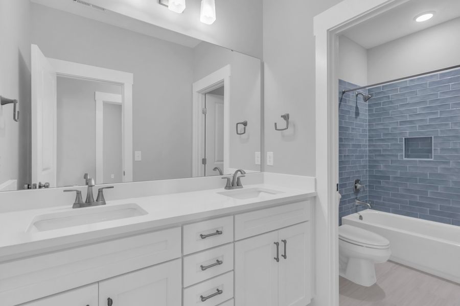 Representative furnished interior of a home built from the The Hampton by RobuckHomes in Stonehenge, Raleigh (Image 18).