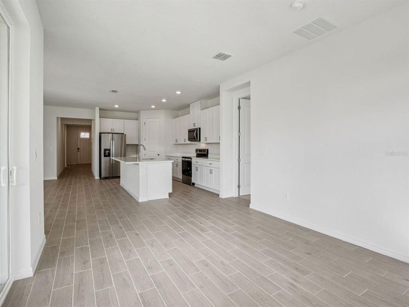 Spacious, unfurnished interior of a new home in Coasterra - Reserve Series, Palmetto (Image 31).