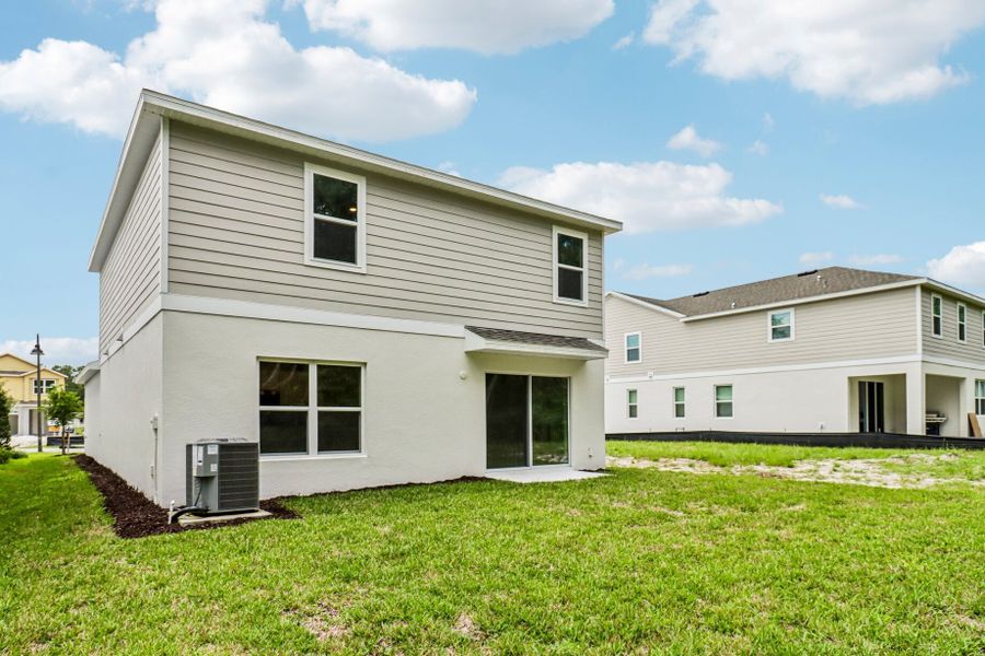 Exterior details and patio area of a home in Beresford Woods, Deland (Image 2). Exterior details and patio area of a home in Beresford Woods, Deland (Image 2).