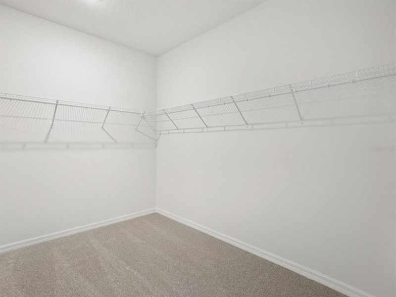 Spacious, unfurnished interior of a new home in Coasterra - Reserve Series, Palmetto (Image 33).