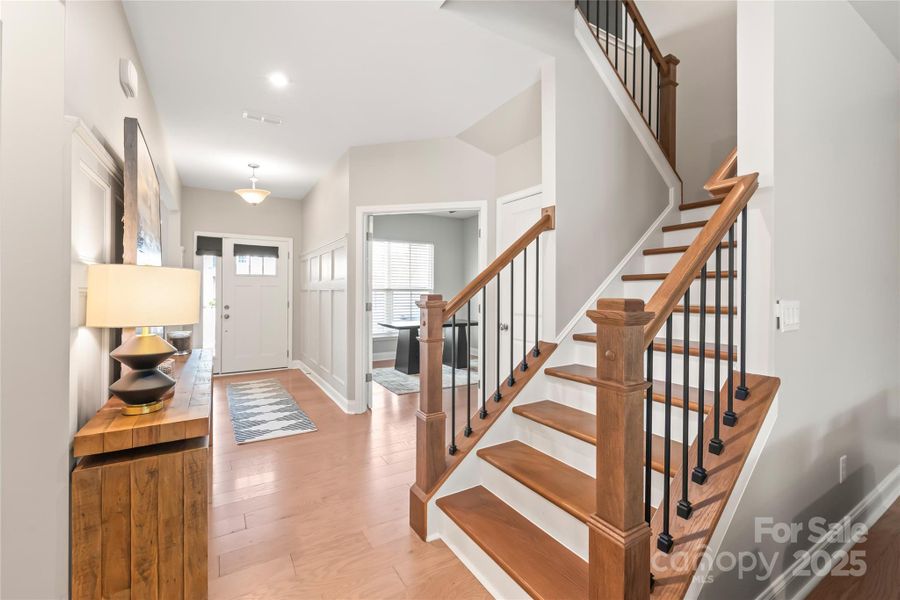 Extra-wide stairs with elegant wrought iron railing. Extra-wide stairs with elegant wrought iron railing.