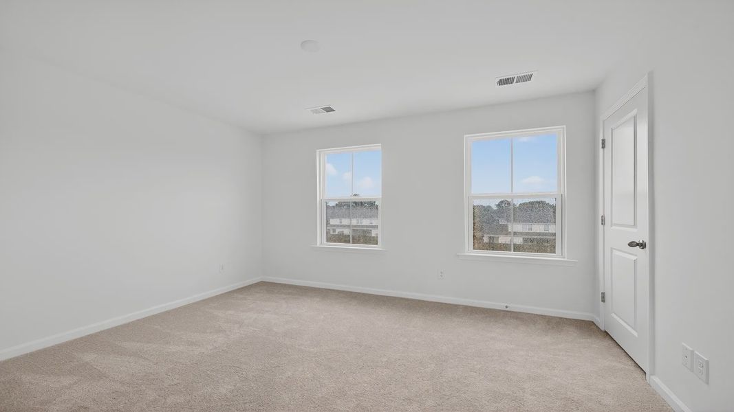 Furnished interior view inside a new home in Clear Springs Townhomes, North Charleston (Image 12).
