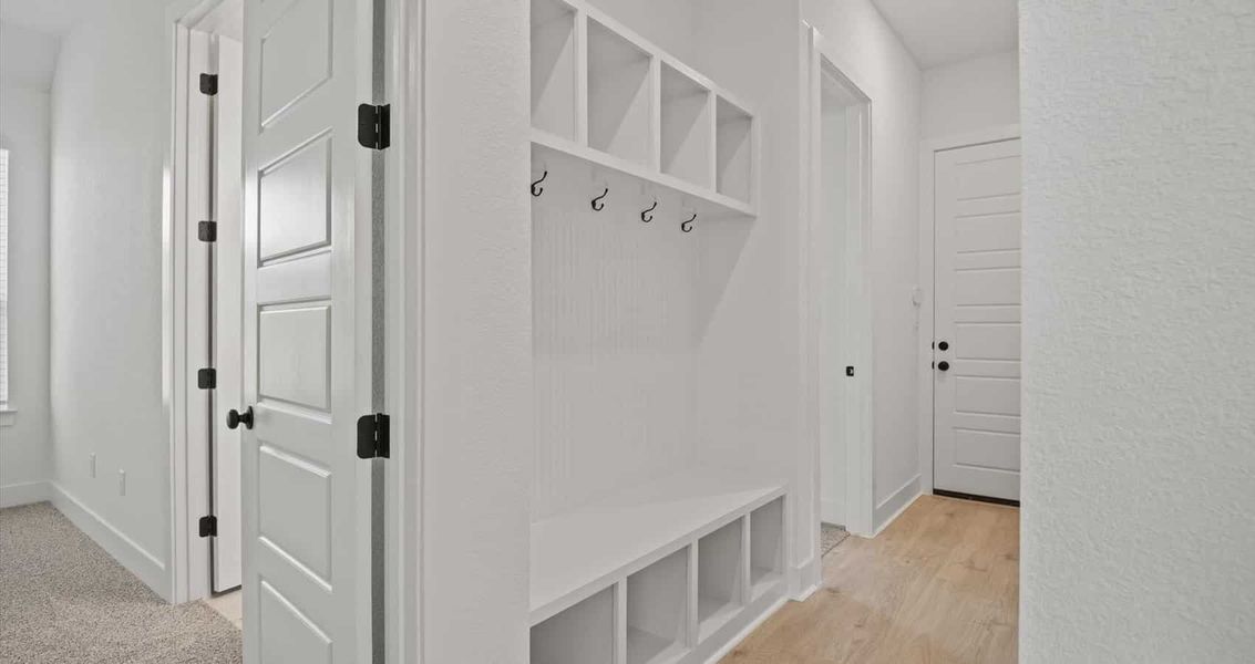 Representative furnished interior of a home built from the Farris by Chesmar Homes in 6 Creeks, Kyle (Image 6).