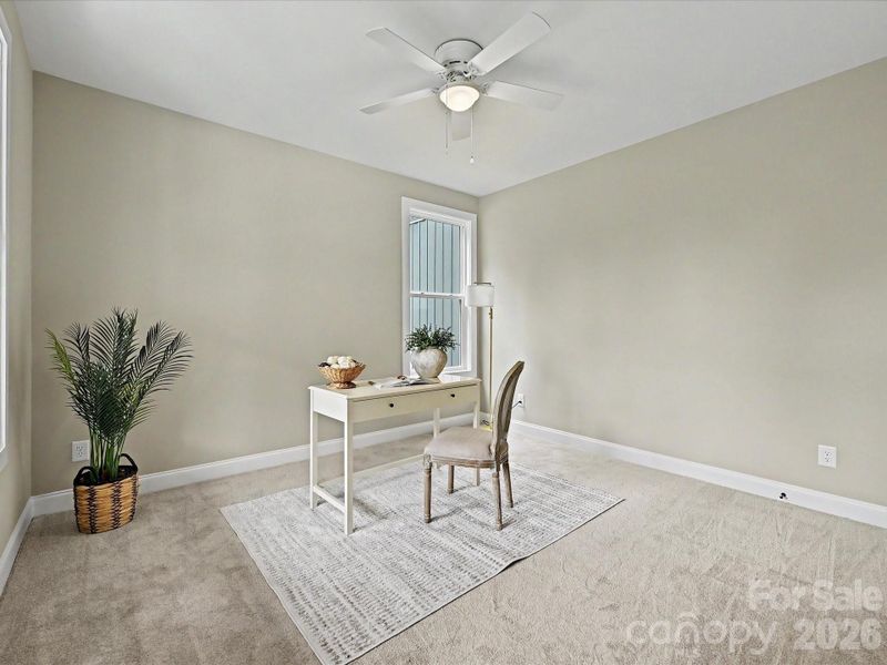 Versatile secondary bedroom offers the perfect space for guests, a home office, or flex room to fit your lifestyle needs.