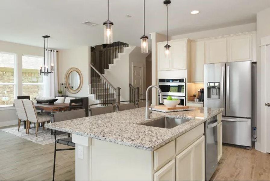 Photo of Pulte model home with same floor plan, not of actual home listed.