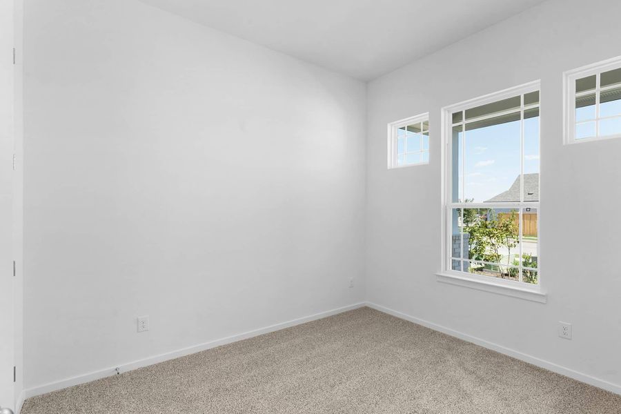Representative unfurnished interior of a home built from the Aventura by Chesmar Homes in Sunterra, Katy (Image 7).