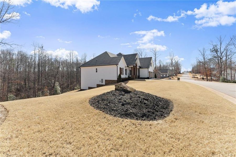 Front exterior of a new home in , Cleveland, GA, highlighting curb appeal (Image 33).