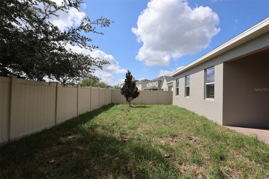 Exterior details and patio area of a home in Bay Lake Farms, St. Cloud (Image 3).