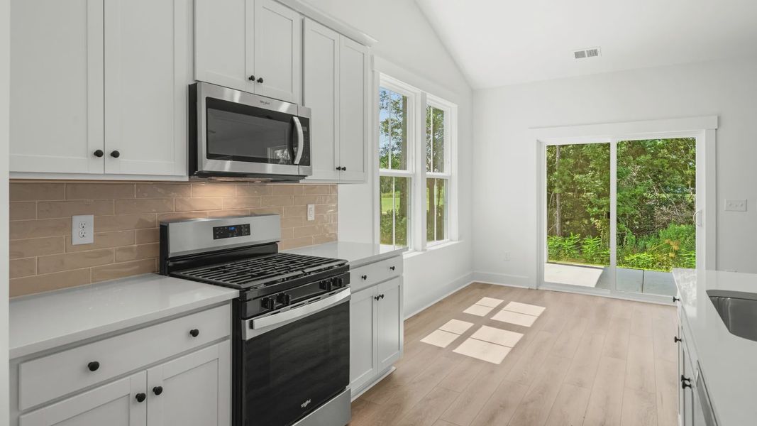 Furnished interior view inside a new home in Bluffs at Sun Colony, Longs (Image 10).