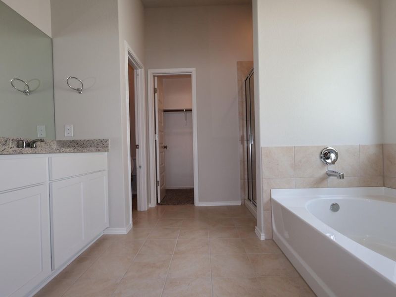 Furnished interior view inside a new home in Heritage, Dripping Springs (Image 6).