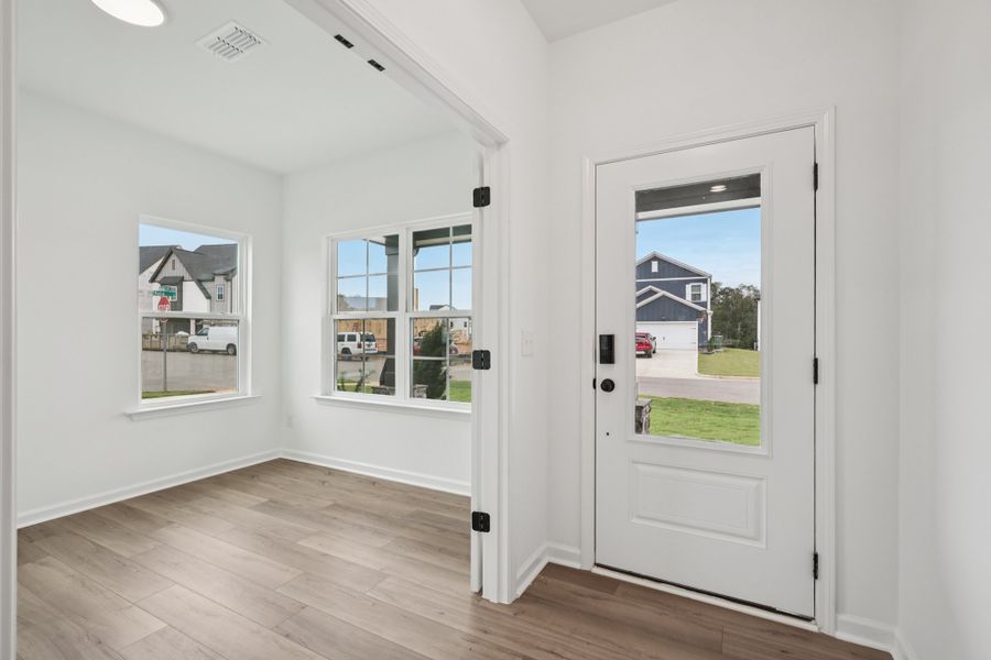 Representative unfurnished interior of a home built from the Macon by Ashton Woods in Rowland's Grant, Fuquay Varina (Image 37).