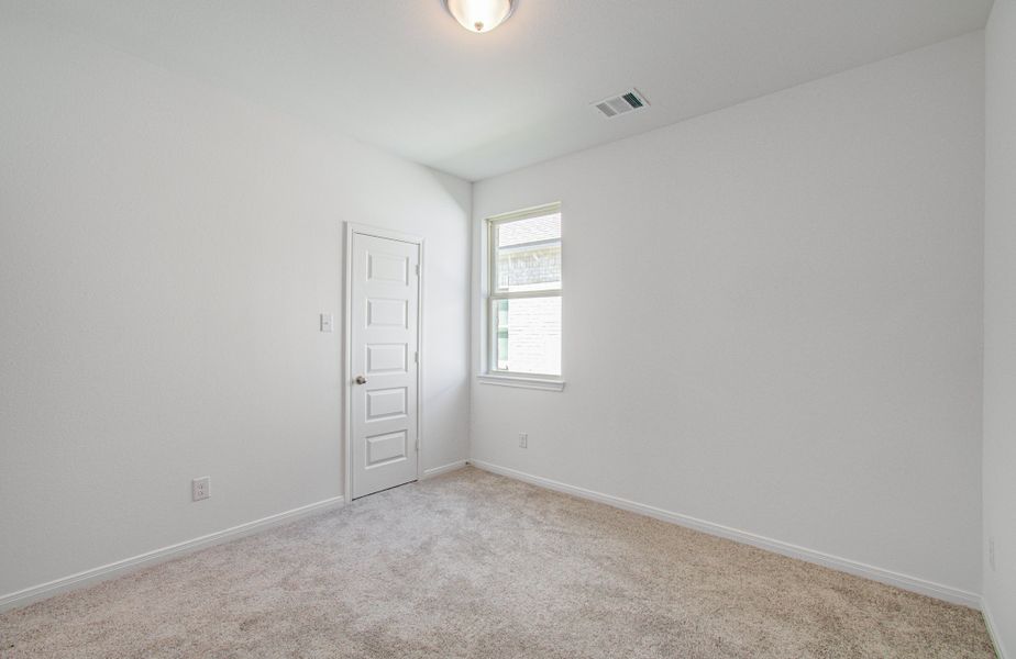 Spacious, unfurnished interior of a new home in Harmony Cove, Humble (Image 39).