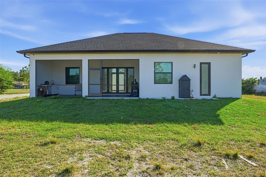 Exterior details and patio area of a home in , Naples (Image 3).