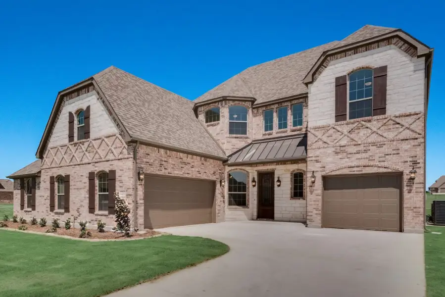 Front exterior of a home in the Trails of Trenton community, located in Trenton, TX (Image 10). Front exterior of a home in the Trails of Trenton community, located in Trenton, TX (Image 10).
