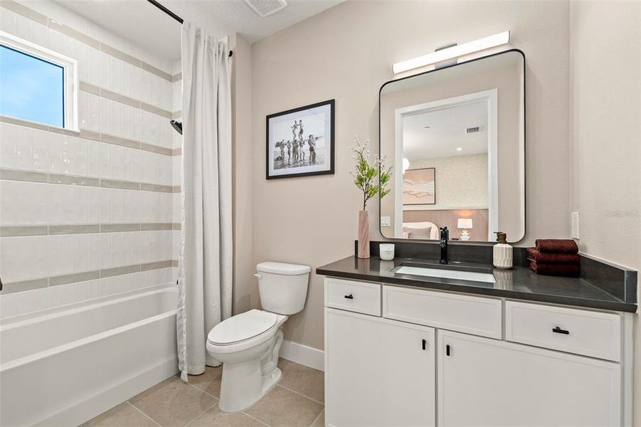 Furnished interior view inside a new home in EvenTide, New Smyrna Beach (Image 26).