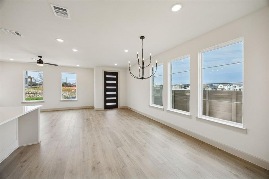 Whether it's lively dinner parties or cozy family get togethers, this dining room fits all occasions.