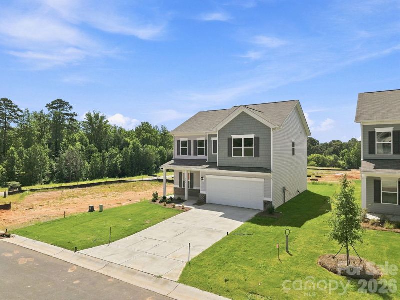 Front exterior of a new home in Catawba Trace, Catawba, NC, highlighting curb appeal (Image 24).