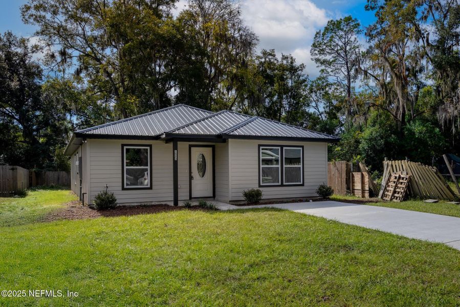 Front exterior of a new home in , Gainesville, FL, highlighting curb appeal (Image 2). Front exterior of a new home in , Gainesville, FL, highlighting curb appeal (Image 2).